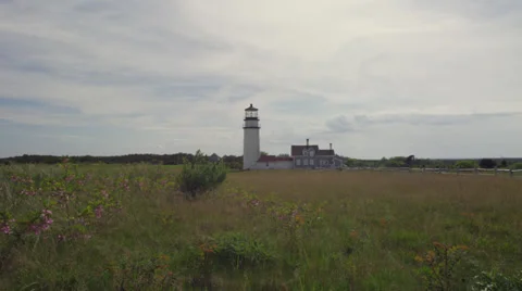 Cape Cod Lighthouse and field cloudy sky Video stock 39586442