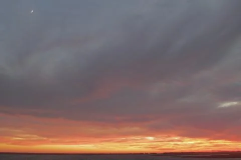 Cape Cod sunset w/moon Stock Photos