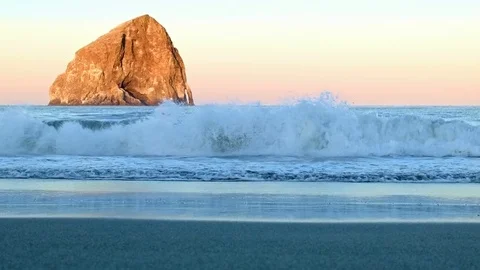Cape Kiwanda Sea Stack similar to Haystack rock wide and waves dawn Oregon Coast Stock Footage 81604696