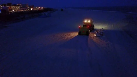 Cape May beach sweeper cleaner night rear Stock Footage 99048397