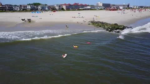 Cape May Surfers Stock Footage 99056252