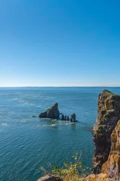 Cape split cliffs and tidal current Stock Photos