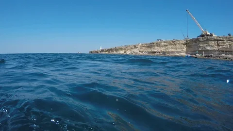 Cape of Tarkhankut in crimea. View of crane for launching yachts and ship on Stock Footage 123726685