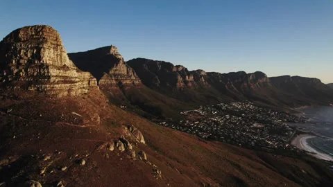Cape Town Aerial pan between Lion's Head and Camps Bay Stock Footage 238709384