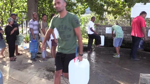 Cape Town residents queue for water Stock Footage 152940085