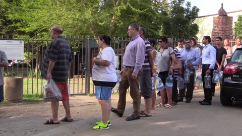 Cape Town residents queue for water Stock Footage 152940125