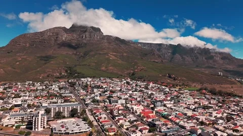 Cape Town suburb with Table Mountain and low clouds aerial Stock Footage 332300000