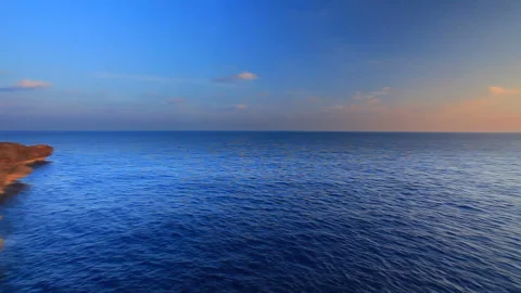 Cape Zanpa Lighthouse, Cliffs, Sea, and Sunrise Vídeo Stock 330455396