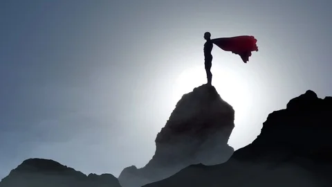 Caped Male Super Hero on Atop Rock Stock Footage