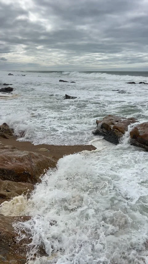 Capela do Senhor da Pedra beach on sandy pinissula washed by winter cold Atlanti Stock-Footage 303004828