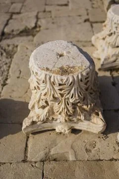 Capital - the upper part of the column close-up. Neoclassical style building Stock Photos