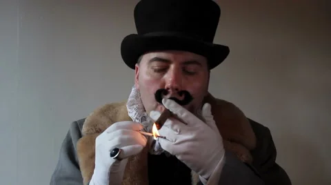 Capitalist lighting a cigar 2 Stock Footage 49929914