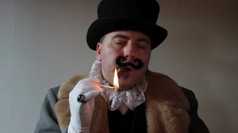 Capitalist lighting a cigar Stock Footage 49929971