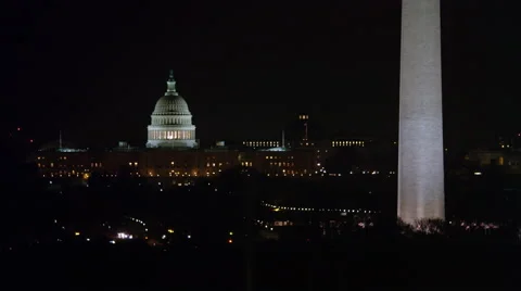 Capitol dome and Washington Monument at night; Lincoln Memorial passes through Stock Footage 59194521