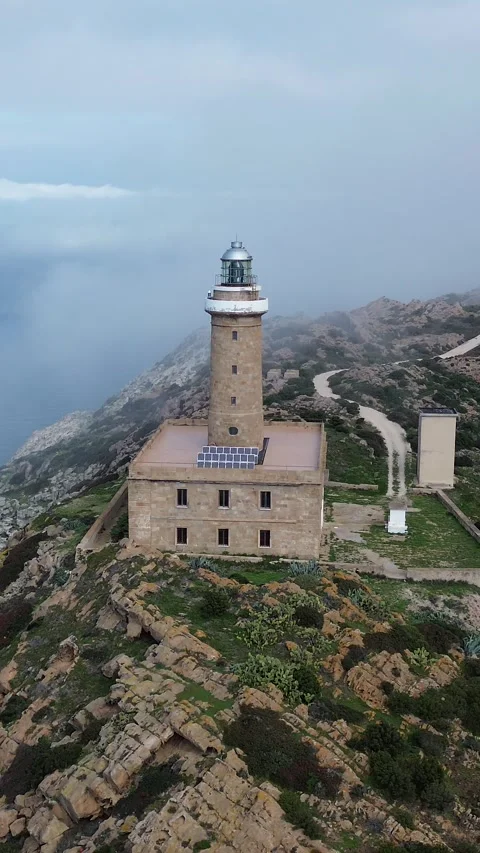 Capo Sandalo Lighthouse Overlooking the Mediterranean Sea on San Pietro Islan Stock-Footage 341765960