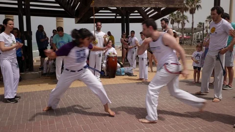 Capoeira at the beach Stock Footage 115624974