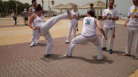 Capoeira at the beach Stock Footage 115628383