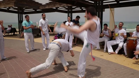 Capoeira at the beach Stock Footage 115628900