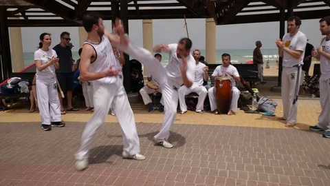 Capoeira at the beach Stock Footage 115631408