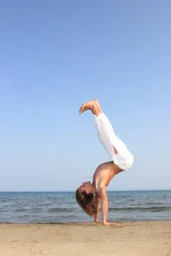 Capoeira dancer on the beach Stock Photos
