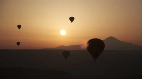 Cappadocia. Balloon Festival. Flight. Sunset. Sun. Hot Gas Balloons Silhouettes Stock Footage