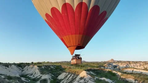 Cappadocia, Turkey - 2022 May 6: Aerial view of many colorful hot air balloons Stockbeeldmateriaal 312040159