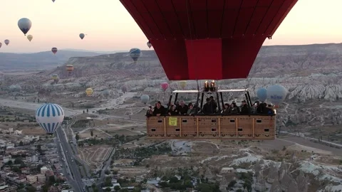 Cappadocia, Turkey - September 22, 2023: hot air balloon basket with people in Stock Footage 269413053