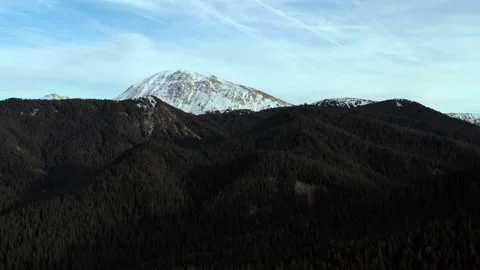 Capped mountain peak with drone to snowy peak Stock Footage