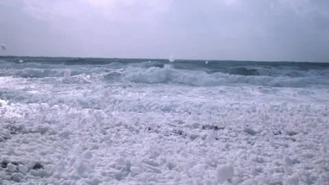 Cappuccino coast effect hitting the beach Stock Footage 148242740