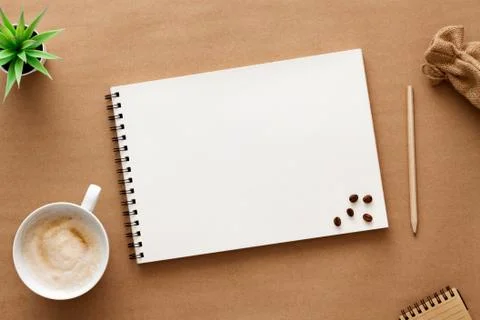 Cappuccino coffee on a brown empty background. View from above. Copy space Stock Photos