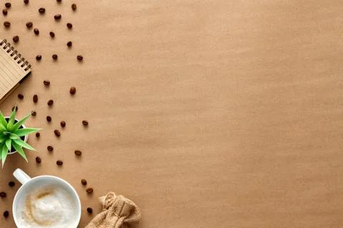 Cappuccino coffee on a brown empty background. View from above. Copy space Stock Photos