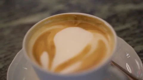 Cappuccino coffee in cup Vídeo Stock 197630975