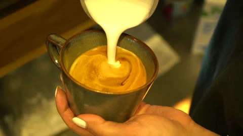 Cappuccino coffee making process with heart Stock Footage 229859721