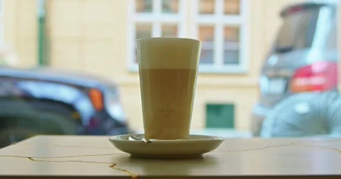 Cappuccino cup standing on a table. Stock Footage 245445488
