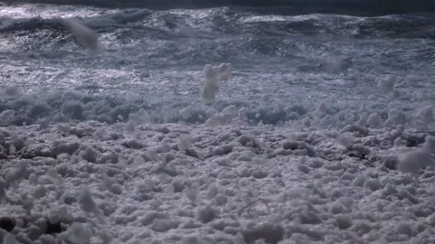 Cappuccino effect hitting the beach Stock Footage 148242750