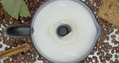 Cappuccino machine, rotates and creates milk foam for cappuccino Stock Footage 165669819