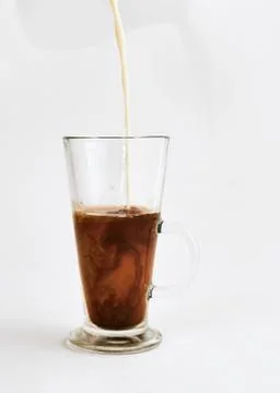 Cappuccino in the process. Stock Photos