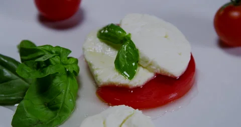 Caprese Salad On A White Plate Stock Footage 243474872