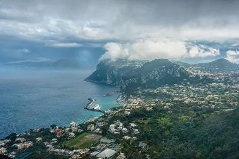 Capri Island view under cloudy sky after storm Stock Photos