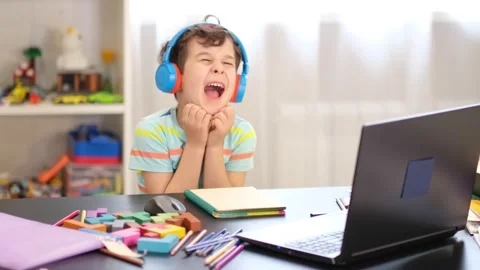Capricious irritated boy does not want to study, do his homework. boring school Stock Footage 153492048