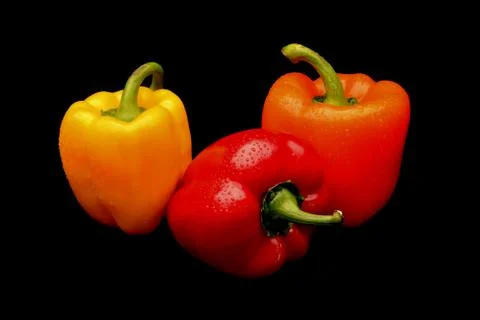 Capsicum on black background Stock Photos