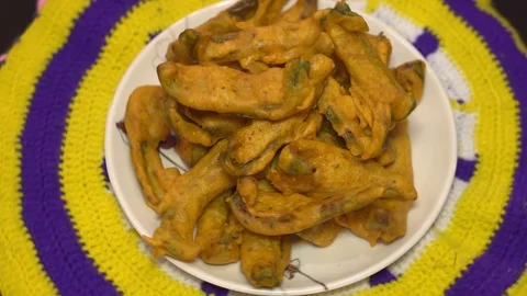 Capsicum Pakodas Turntable Top view 4K Video stock 119418712