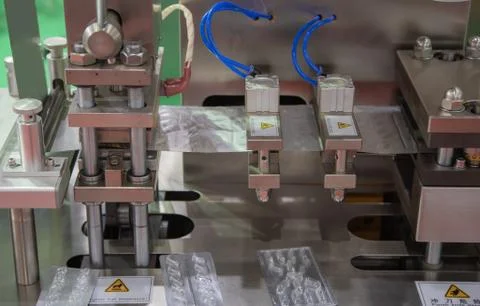 Capsule blister packing machine Stock Photos
