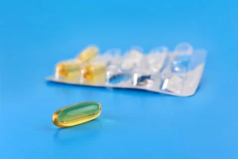 A capsule of a complex of polyunsaturated fatty acids. Prevention and treat.. Stock Photos