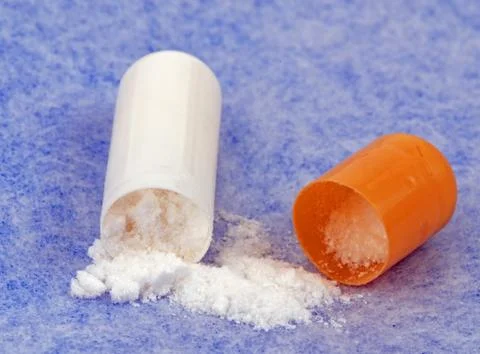 Capsule with content Stockfoto's