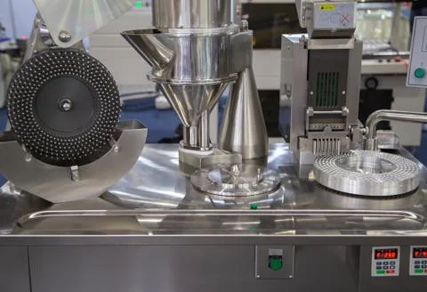 Capsule filling machine Stock Photos