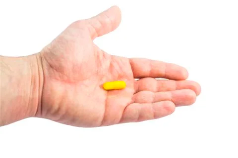 Capsule in hand Stock Photos