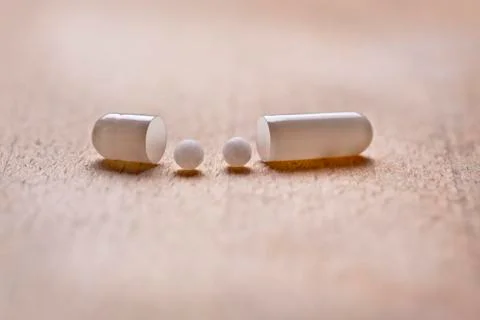 Capsule pill with homeopathy Stock Photos