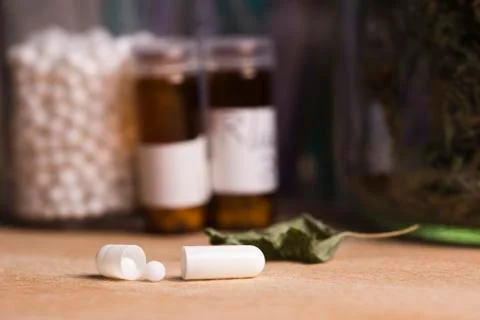 Capsule pill with homeopathy Stock Photos