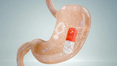 Capsule pill inside human stomach showing digestion process, treatment Stock Footage 317296382